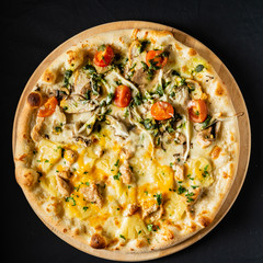 pizza on the black background