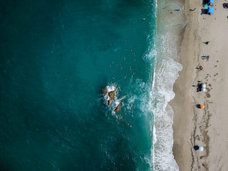 Aerial View From Flying Drone Of People Relaxing