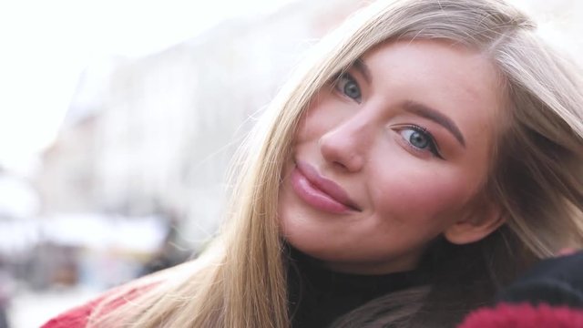 Beautiful girls makes picture in european city.