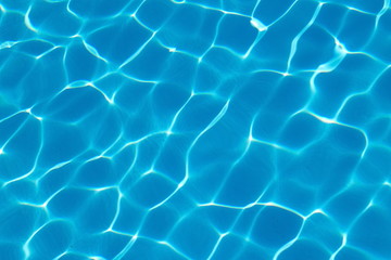  Rippled pattern of blue clean water in a  swimming pool.