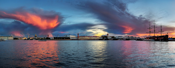 View Saint Petersburg at sunset with beauty sky and clouds. City panorama on Vasilyevsky island, Nevsky prospect and palace bridge early