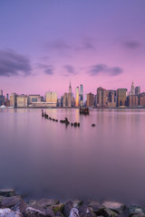 Fototapeta na wymiar View on Midtown Manhattan from east river at sunrise with long exposure