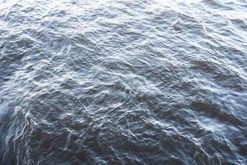 The exciting water surface of the river, sea, ocean, lake, pond, reservoir, pool