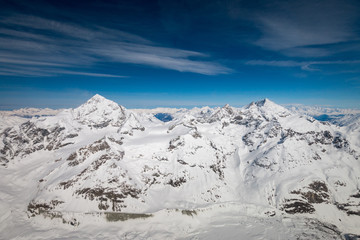 Fototapeta na wymiar Aerial view of Dent Blanche mountain (left) and Weisshorn mountain (right) in the Swiss alps 