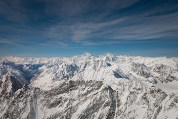 Aerial view of landscape in the Italian and French alps with Mont Blanc .