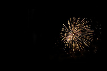 Golden fireworks with copy space