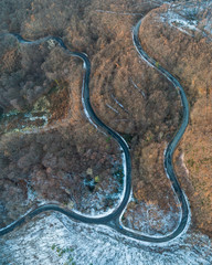view of curvy road in Mecsek forest at winter