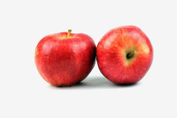 two red apples on white background