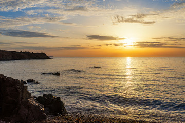 Fototapeta na wymiar Sunrise on the beach, Cap Roux, Saint Raphael 