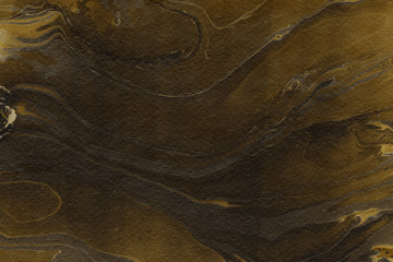 Luxury gold marble ink paper texture on dark watercolor background. Chaotic abstract organic design. Bath bomb waves.