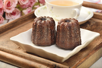 Canele cake - traditional French sweet dessert 