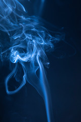 Abstract blue smoke swirls