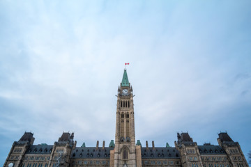 Fototapeta na wymiar Main clock tower of the center block of the Parliament of Canada, in the Canadian Parliamentary complex of Ottawa, Ontario. It is a major landmark, containing the Senate and the house of commons