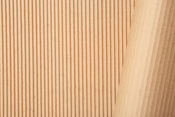 Corrugated cardboard as background, top view with space for text. Recyclable material