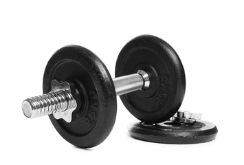 Obraz na płótnie Canvas Professional dumbbell and weight plate on white background. Sporting equipment