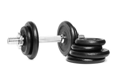 Fototapeta na wymiar Professional dumbbell and weight plates on white background. Sporting equipment