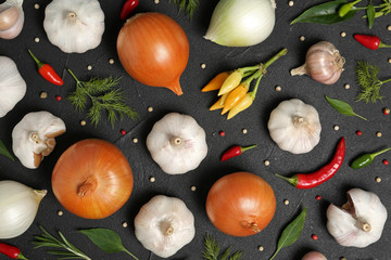 Flat lay composition with garlic and onion on table © New Africa
