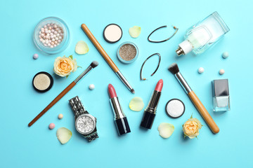 Flat lay composition with lipstick on color background