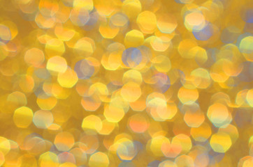 Gold, sparkle, glitter and shine. Festive shiny abstract background of textured twinkling yellow gold. Celebrate Holidays or party festivities with this sparkling backdrop.              