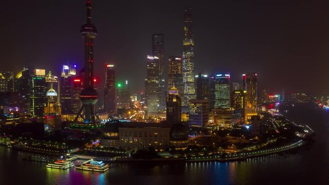 China Shanghai Aerial v45 Hyperlapse flying around landmark waterfront at night with views of traffic 10/18