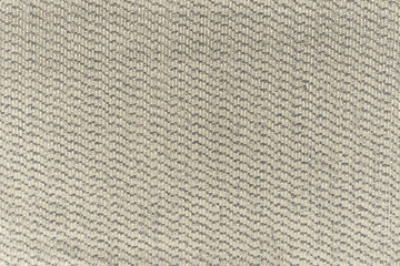 Luxury gold textile background. Silk cloth texture. Fabric pattern.