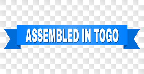 ASSEMBLED IN TOGO text on a ribbon. Designed with white caption and blue tape. Vector banner with ASSEMBLED IN TOGO tag on a transparent background.