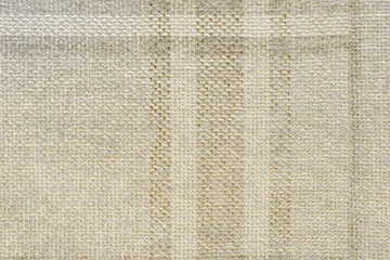 Fototapeta na wymiar Luxury gold textile background. Silk cloth texture. Fabric pattern.