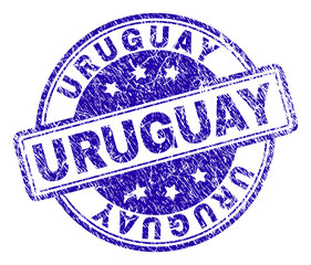 URUGUAY stamp seal imprint with grunge texture. Designed with rounded rectangles and circles. Blue vector rubber print of URUGUAY tag with grunge texture.