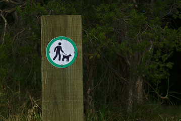 Dogs must be on leash sign