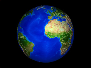Guinea-Bissau on planet planet Earth with country borders. Extremely detailed planet surface.