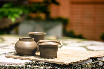 Drying clay pot after molding.