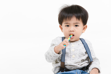 Asian kid on isolated background