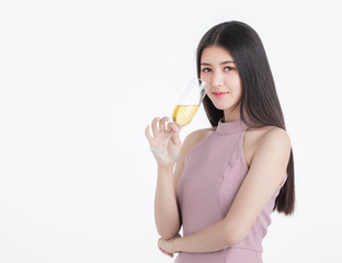 Confident woman posing with champagne glass.