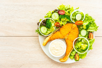 Grilled salmon meat steak with fresh vegetable
