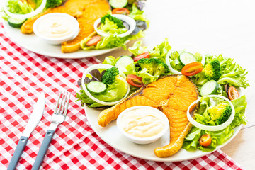 Grilled salmon meat steak with fresh vegetable
