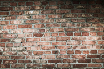 walls with red cracked bricks antique brickwork