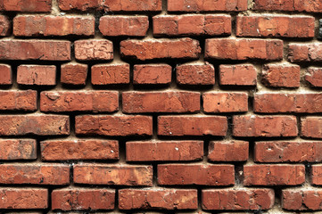 Obraz premium Old brick wall with red bricks close up