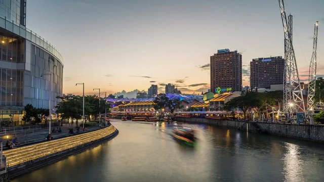 4K Day to Night Sunset Time Lapse Of Boats Streaming Past In Clarke Quay. ProRes 422 in 4k