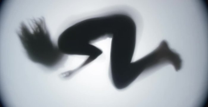 female silhouette on a white matte background