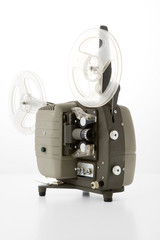 Old film projector on a white background