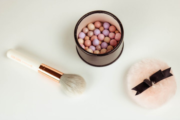 Cosmetoc products. Lush brush, meteorite. white background.