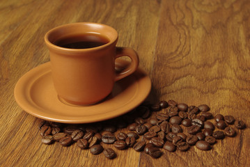 Cup of coffee on a wooden table
