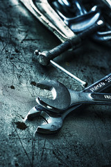 wrenches on work bench detail