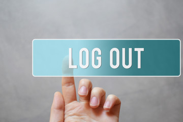 Log out - finger pressing blue transparent button on virtual touchscreen interface on gray background with copy space for text. Internet networking and social media concept.