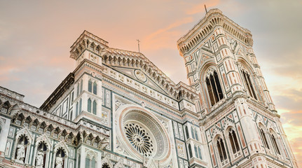 Fototapeta premium Florence, Tuscany / Italy. - December 23, 2018. Streets of Florence at sunset, far away you can see the Cathedral of Santa Maria Del Fiore, travel to Europe, holidays in Italy