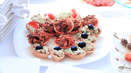 catering table set service with silverware and glass stemware at restaurant before party