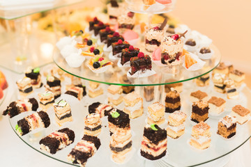 Different kinds of baked sweets on a buffet
