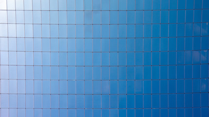 Glass windows of skyscrapers, texture. Matte surface not reflecting the sky