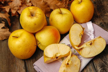 Naklejka na ściany i meble Fresh organic apples on rustic wooden table. Close-up.