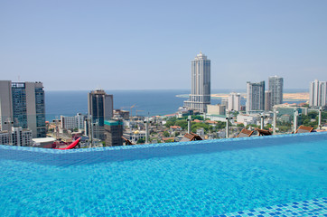 Fototapeta na wymiar The pool in hotel overlooking the capital of Colombo in Sri Lanka